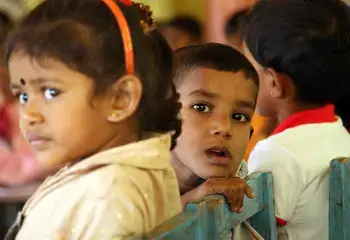 Young children wait in Sri Lanka for Mobile Health Clinic at "Ekamuthu" Pre-School.
