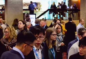 People meeting at the HNPW meeting in 2020, in the exhibition area