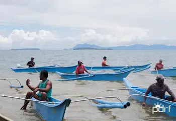 New fiberglass boats float in the water after a Typhoon Odette recovery programme by the Philippine Disaster Resilience Foundation (PDRF) that taught certain communities how to build and repair such boats. Photo by PDRF.
