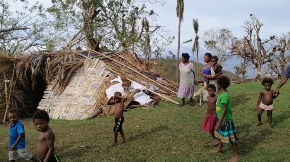 Vanuatu residents survey their destroyed homes on the island of Espiritu Santo following the cyclone in April [Courtesy of Dr Christopher Bartlett]