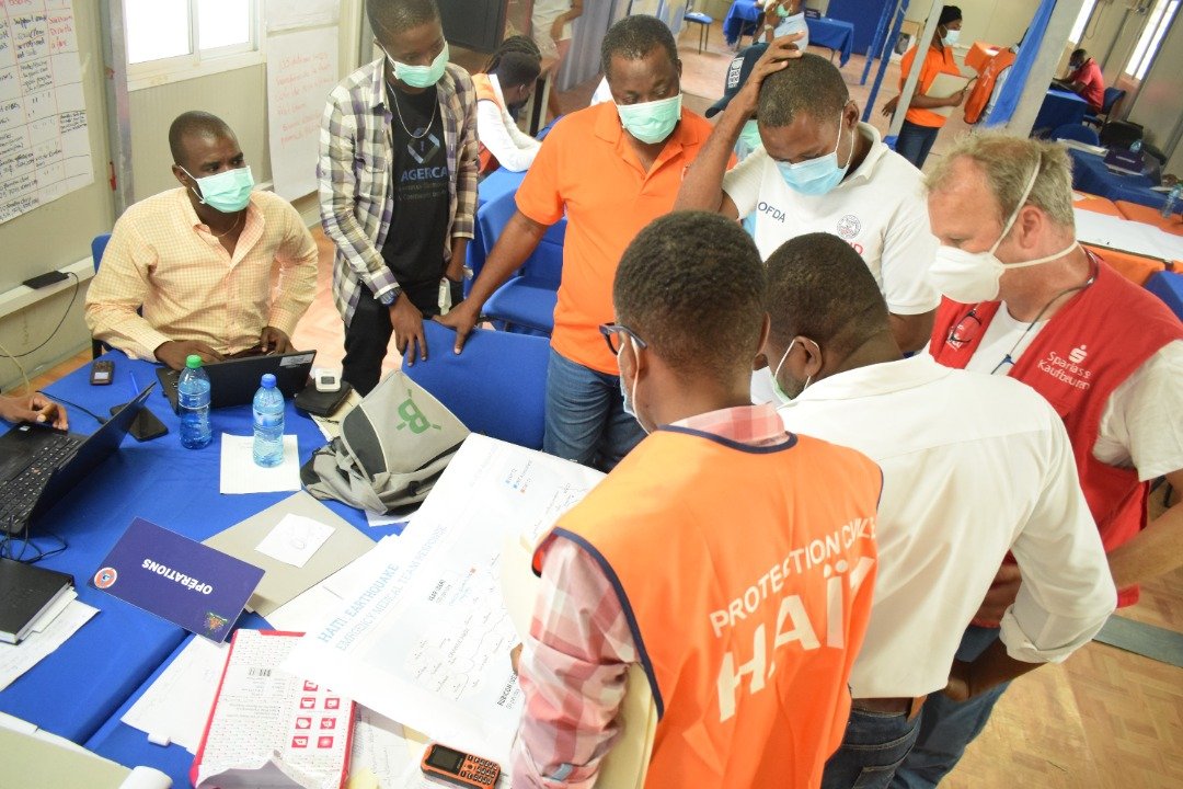 AGERCA team members in a meeting with the Emergency Operation Centre