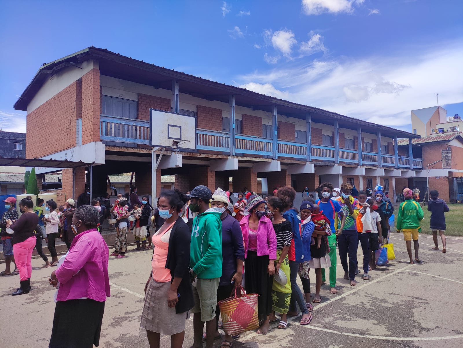 Families lining up for food distribution