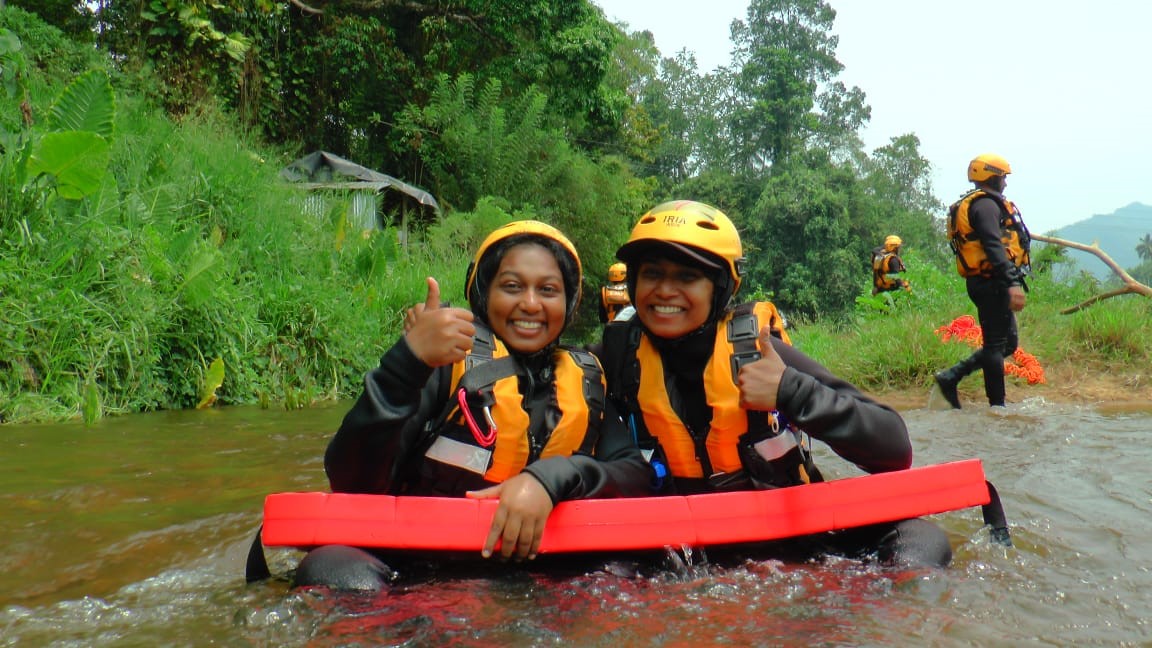 Two women participating in the A-PAD SL SAR swift water rescue training. (Photo Credit: A-PAD SL)