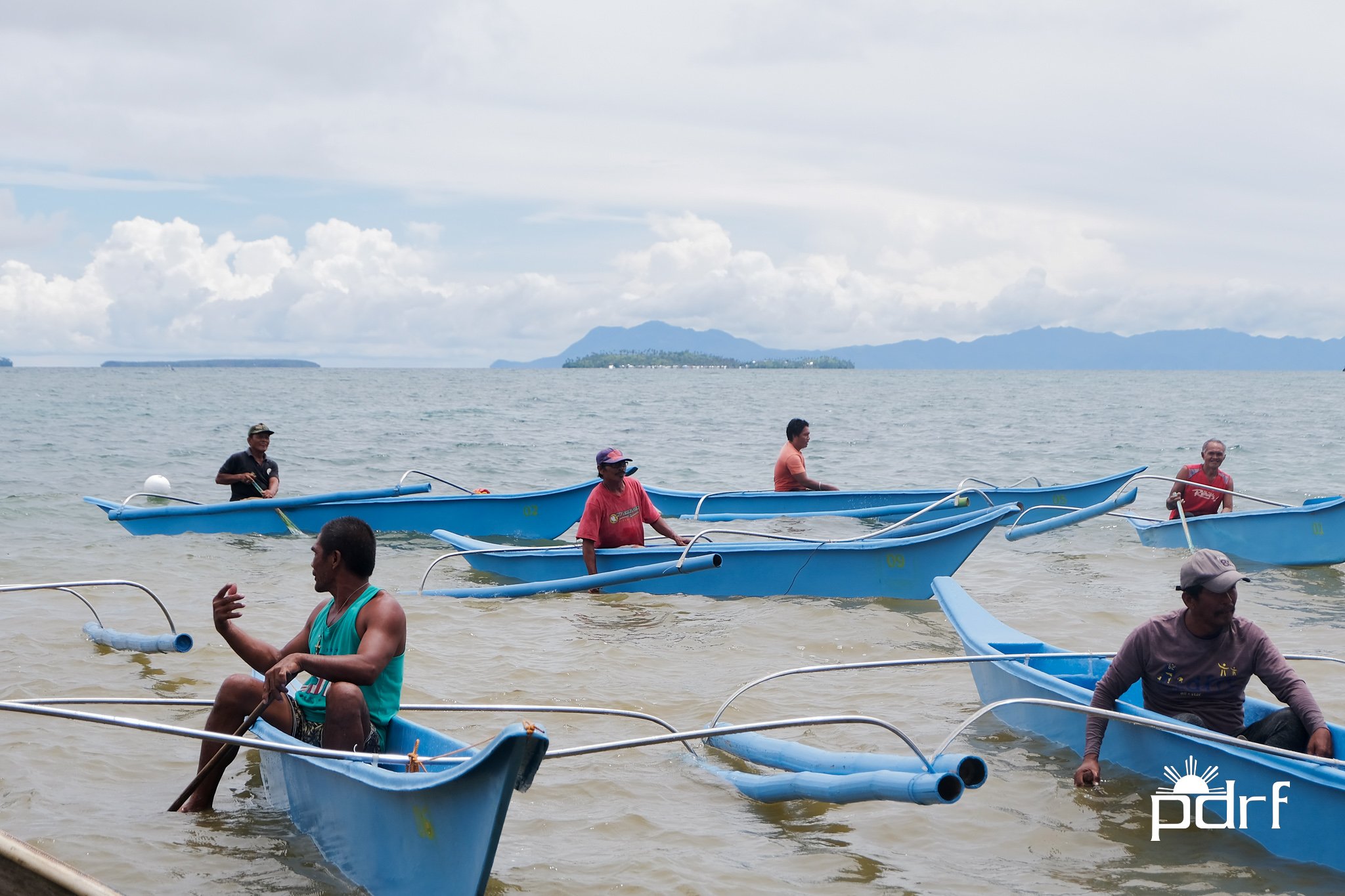 New fiberglass boats float in the water after a Typhoon Odette recovery programme by the Philippine Disaster Resilience Foundation (PDRF) that taught certain communities how to build and repair such boats. Photo by PDRF.
