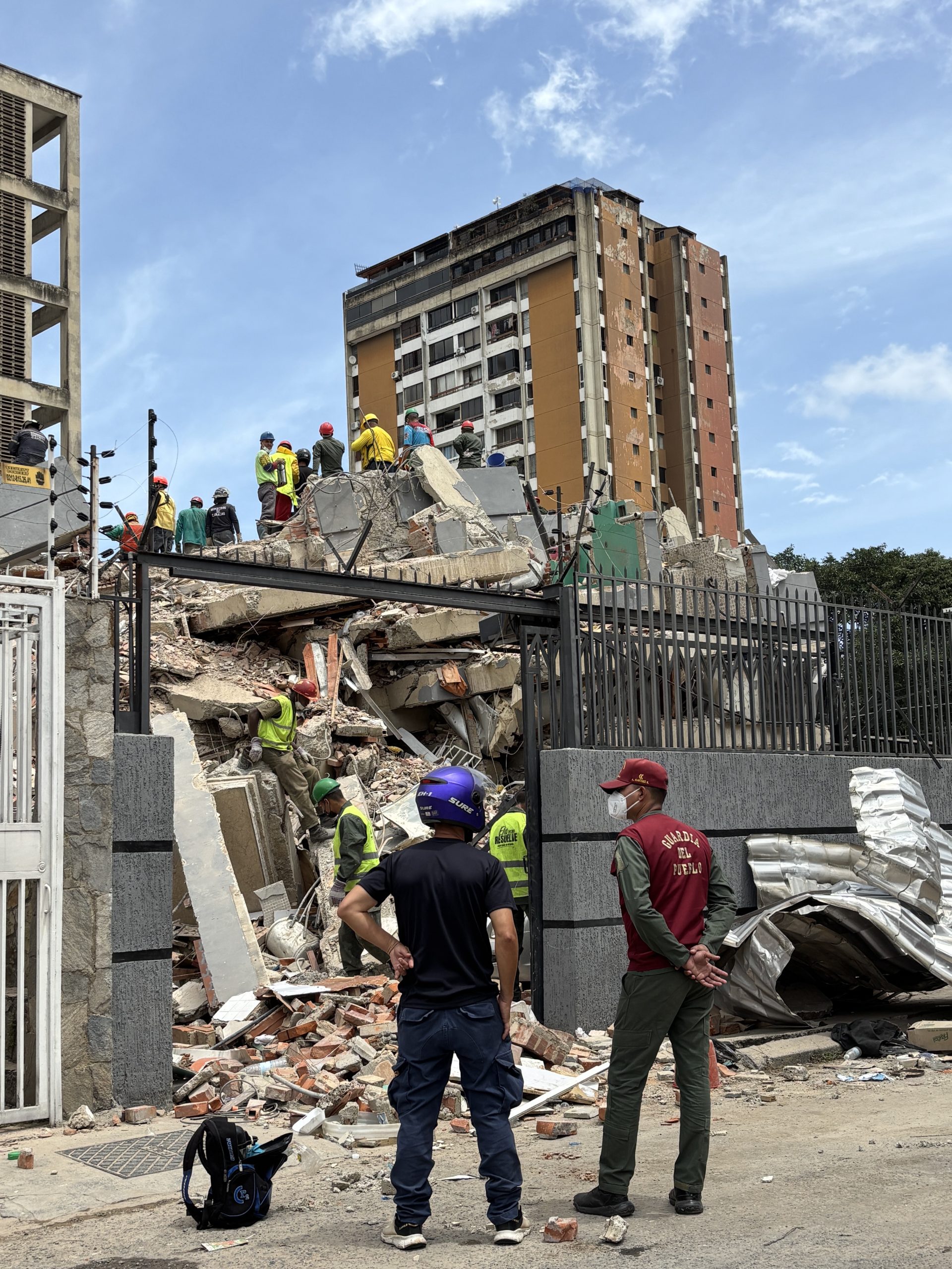 Search-and-rescue teams work through the rubble of a collapsed building in El Paraíso, southwest Caracas, after devastating earthquakes struck Venezuela on 24 June 2026. Photo: UNOCHA/Luisana Solano