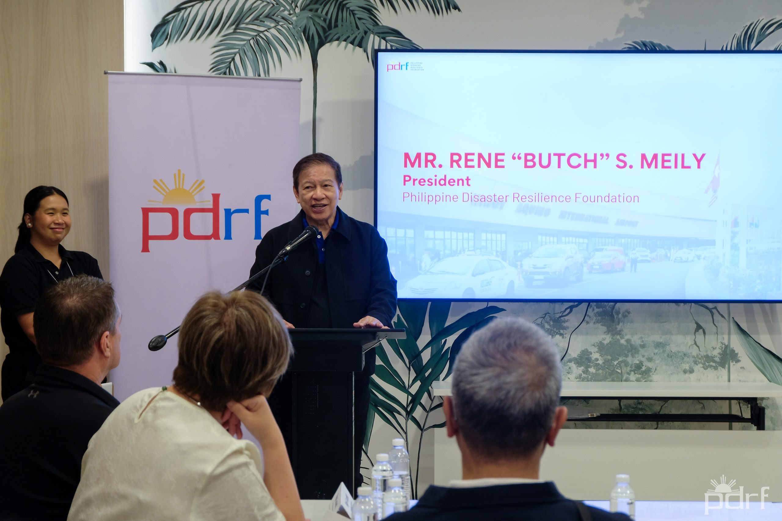 Rene “Butch” Meily, President of the Philippine Disaster Resilience Foundation, addresses the room. PDRF has now supported GARD workshops across four Philippine airports — Clark, Cebu, Cagayan de Oro and NAIA — and is pushing to take the same methodology to the country's smaller regional airfields. Photo credit: PDRF